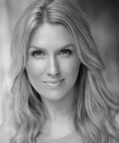 A black and white headshot of Gemma Naylor.