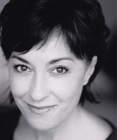 Black and white headshot for Ria Jones.