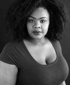 A black and white headshot of actor Anelisa Lamola