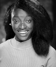 A black and white headshot of actor Jochebel Ohene MacCarthy