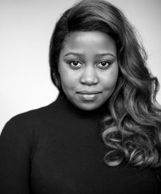 A black and white headshot of Karen Mavundukure