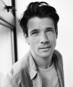 Black and white headshot for Danny Mac