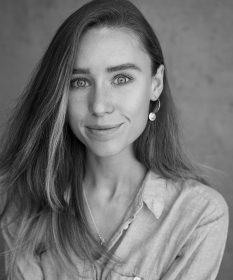 A black and white headshot of Jessica Paul.